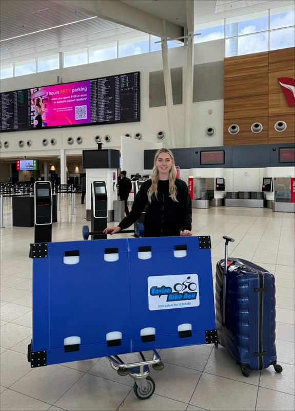 Chloe Moran travelling through an airport transfer with the Enviro Bike Box during her relocation to Brisbane.